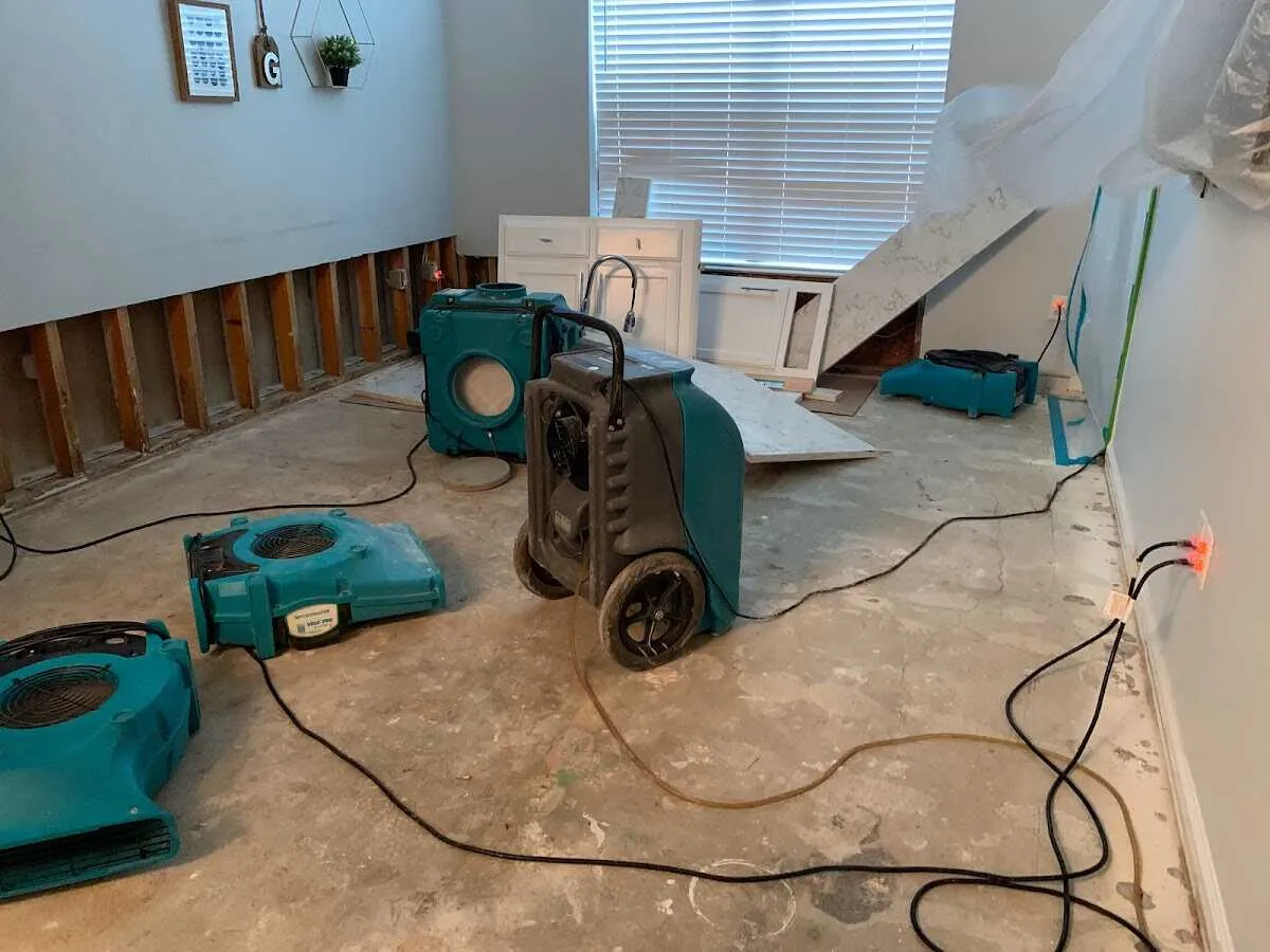 Dehumidifier in flood-cut room for Water Damage Restoration in Lower Burrell